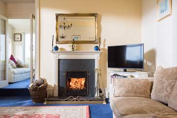 Light the fire on a chilly day or evening and, whatever the weather is doing outside, you will be warm and cosy in this welcoming house.