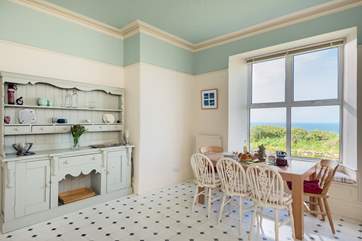 The light and spacious kitchen has a super view from the large picture window.