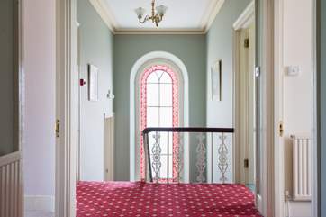 The landing with a fabulous arched Georgian window.
