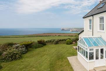 The lawned-area beside the house is the perfect spot to relax and enjoy the views and is completely private from Frog Rock Cottage.