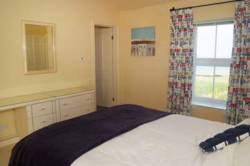 Views from the double bedroom and a door to the en suite.