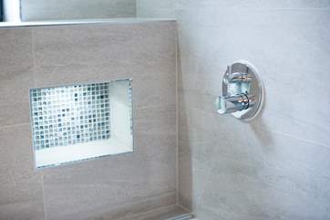 The bathrooms and shower-rooms are fully tiled.