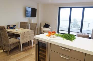 The open plan living space is perfect for cooking, dining and relaxing with friends and family.