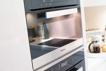 The quality kitchen includes Miele and Neff appliances.