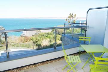 Enjoy a meal on the balcony, taking in the views.