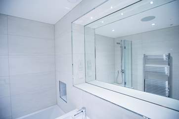 The bathroom mirrors are equipped with de-mist technology.