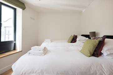 Bedroom 2 has twin beds.
