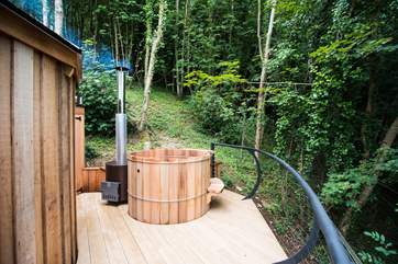 The hot tub also sits on the deck and affords the same fabulous views.