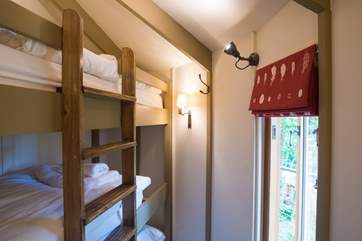The triple bunk-room is compact but each bunk has lovely comfy mattresses and beautiful bed linens.