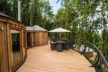 Another view of the deck with Owl Cedar Yurt below (but spaced well apart).