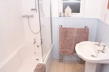 The bathroom is really pretty - a three-quarter sized bath fits perfectly and you have the flexibility of a shower too (there is also a downstairs WC).