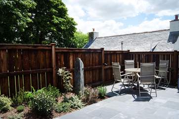The spacious enclosed patio behind the cottage.