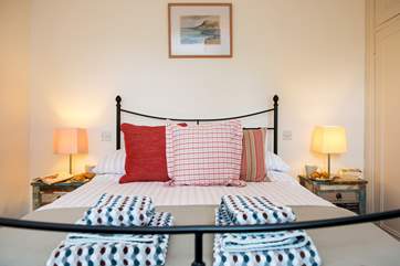 The master bedroom is beautifully styled.