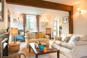 The sitting-room in light, warm and very cosy.