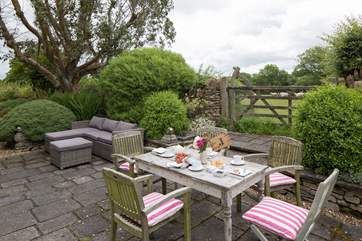 The beautifully stocked and fully enclosed gardens wrap around the house with rural views in every direction.
