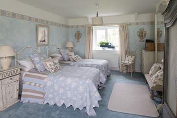 Bedroom 2 has 3ft twin beds, a spacious en suite bathroom and views over open countryside.