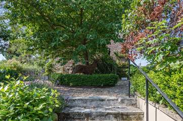 This elegant garden will greet you as you walk from the parking area.