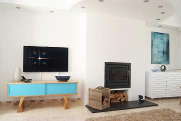 There is a large Smart television and Blu-ray DVD player.
