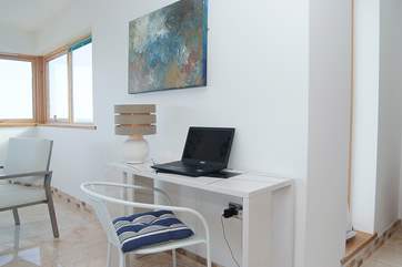 A laptop is provided for guests' use.