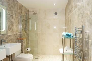 The shower-room has a large walk-in shower.