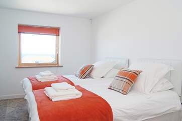 Bedroom 3 has 'zip and link' (3' twins or 6' double) beds shown here made up as twins.