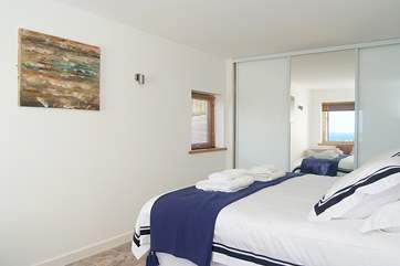 Bedroom 4 has 'zip and link' (3' twins or 6' double) beds shown here made up as a double.