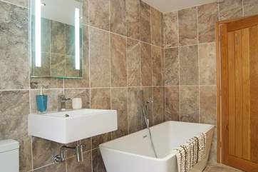The bath is deep and double-ended.