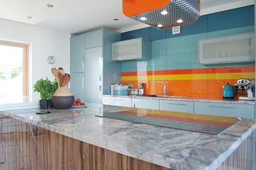 The big kitchen island is perfect for prepping food and cooking together.