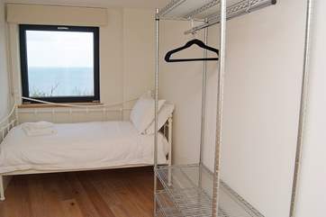 The single bedroom.