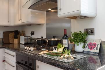 The contemporary kitchen has plenty of storage space.
