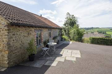 There is a sitting-out area at the front of the cottage to catch the evening sun.