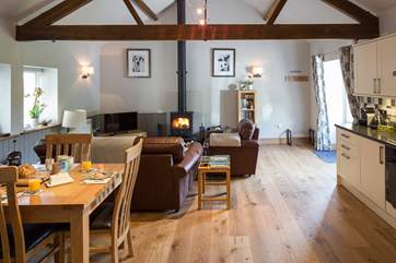 The open plan interior has a wood-burner making this a great place to stay whatever time of year.