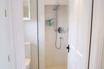 The wet-room is next to the open plan living-room.