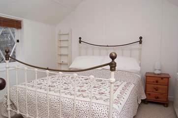The first floor double bedroom (accessed through the single bedroom).