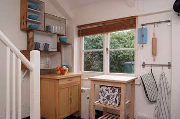 The kitchen - stairs lead up from here to the bedrooms.