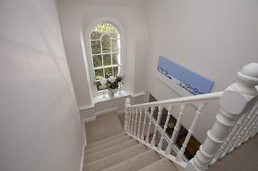 Even the stairwall is striking, with its gorgeous period window overlooking the little lane at the back.