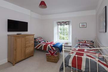 The third bedroom can be set up as twins or pushed together as a double if you wish. There is a television and even an Xbox for your children to enjoy.