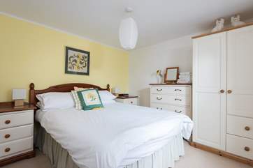 The pretty double bedroom, one guest said in the visitor book 'comfy beds and lovely decor, a great find.'