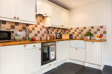 The delightful kitchen-area is very well-equipped.