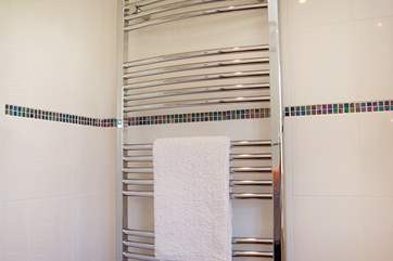 A big heated towel rail will keep towels toasty warm.