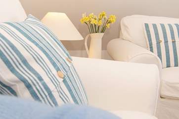 Lovely cushions and throws to cosy up with.