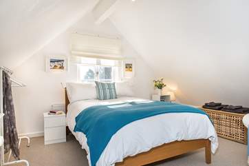 The lovely bed is bespoke being the standard width but 7 feet long- perfect for tall people!