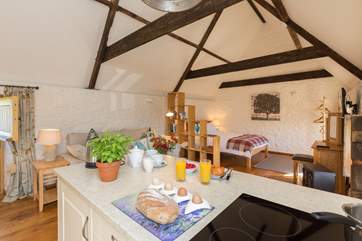 High ceilings and original beams have kept the character of this lovely old building.