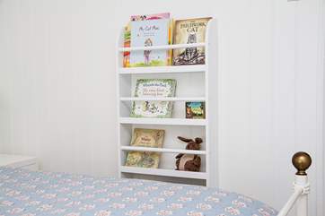 Children's books in Bedroom 2.