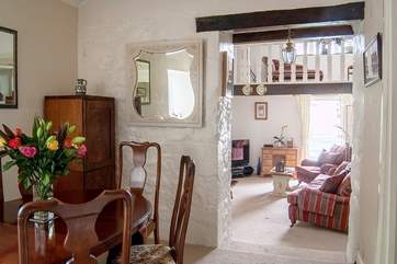 Looking through to the sitting-room from the split-level dining-room.