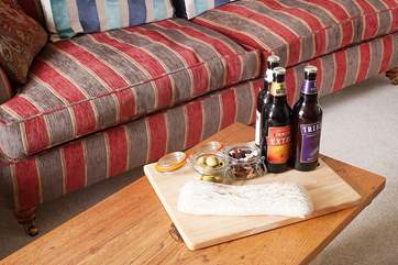 Comfy seating to relax in after a day on the beach or walking the coast paths; time to try the local brews perhaps?