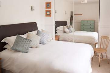 The lovely double bedroom with 5' double bed and lots of storage.