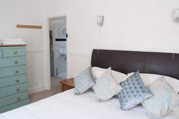 Looking from the bedroom across to the bathroom opposite.