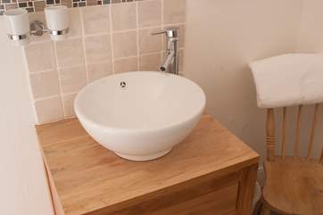 Both bedrooms have wash-basins which are both stylish and convenient.