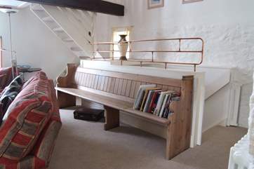 The owners have thought of everything, even crafting a bespoke railing at the top of the stairs.